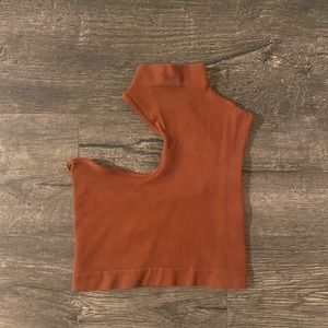 Orange/brownish crop top. One size